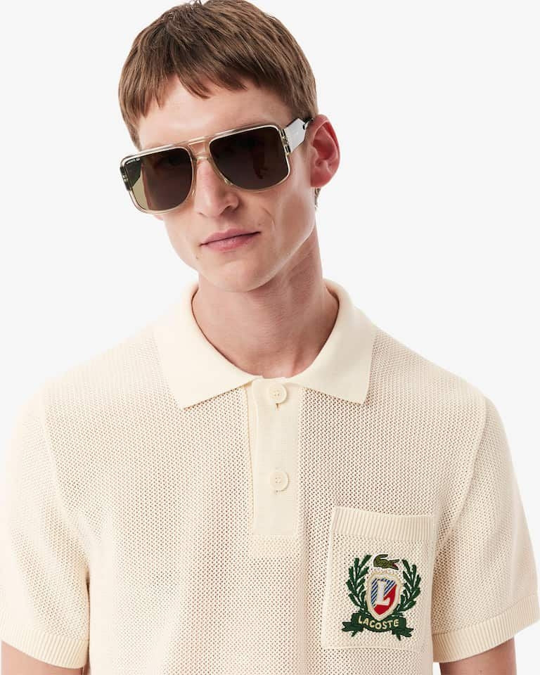 Polo Lacoste in maglia con logo ricamato