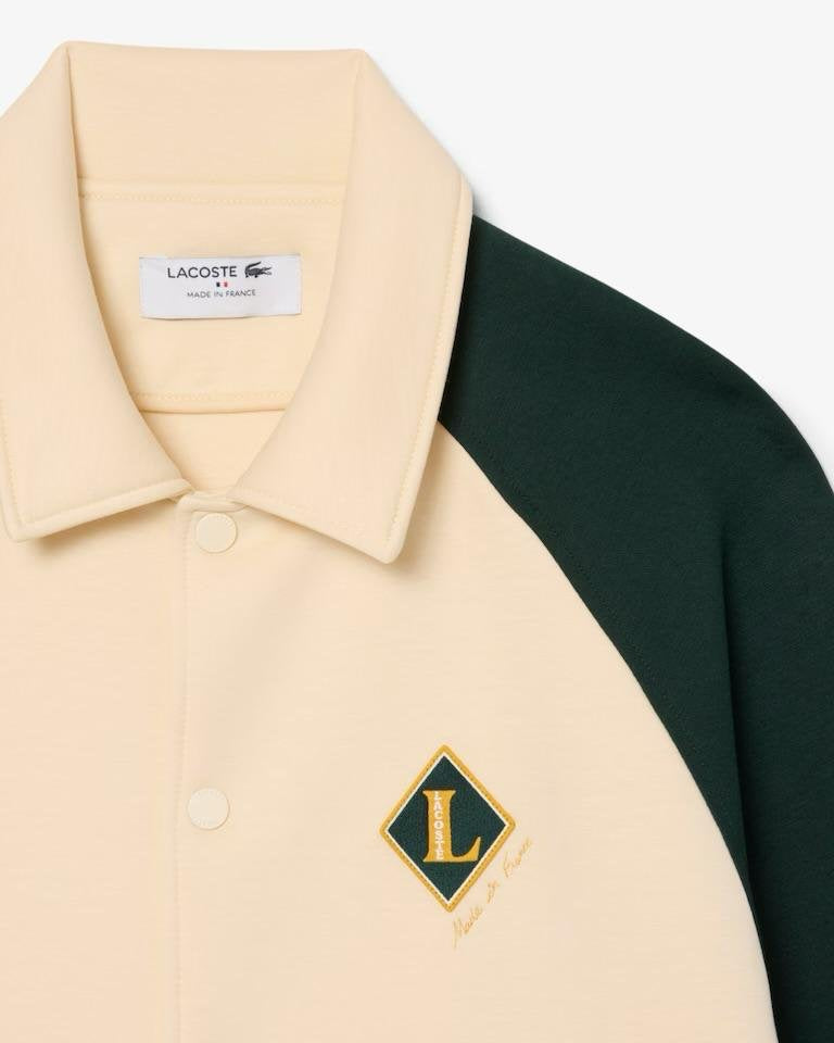 Felpa polo Lacoste con patch logo e color block