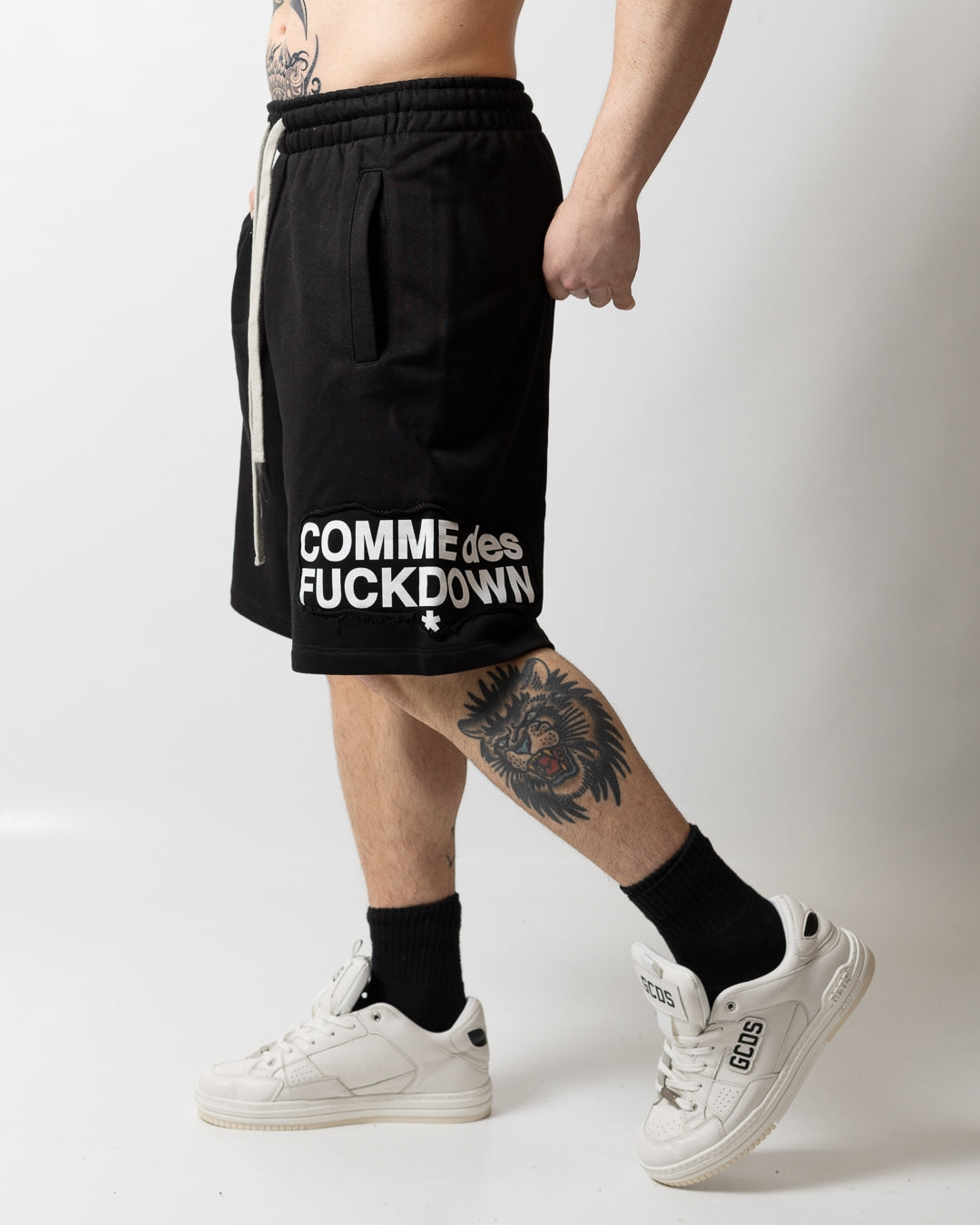 Bermuda Comme des Fuckdown in felpa con taglio uomo