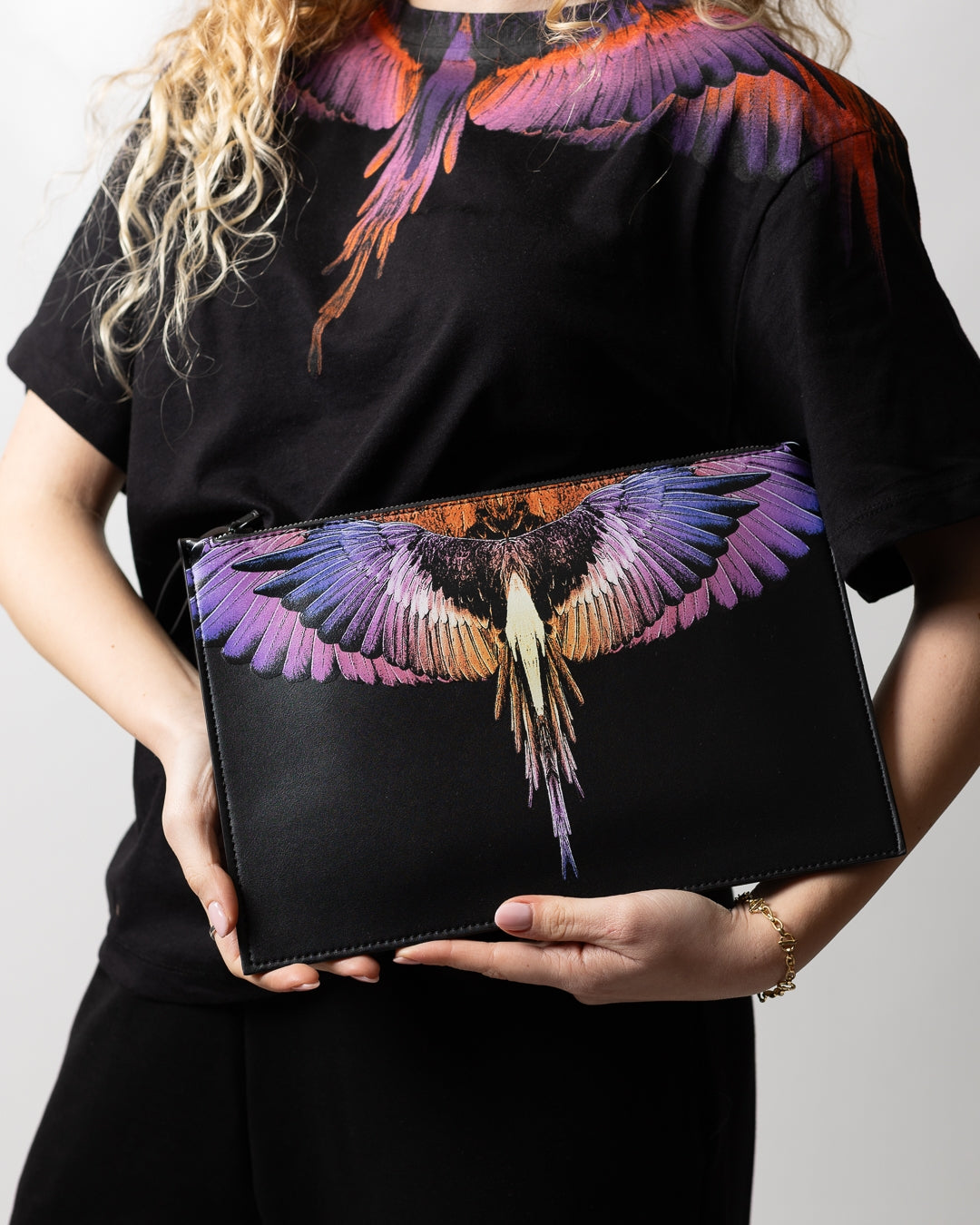 Pochette Marcelo Burlon in ecopelle "Icon Wings Orange" logato