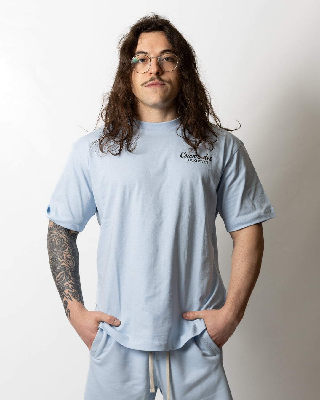 T-Shirt Comme des Fuckdown con stampa signature uomo