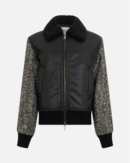 Giubbotto Iceberg in eco montone e lana con logo metallico in rilievo