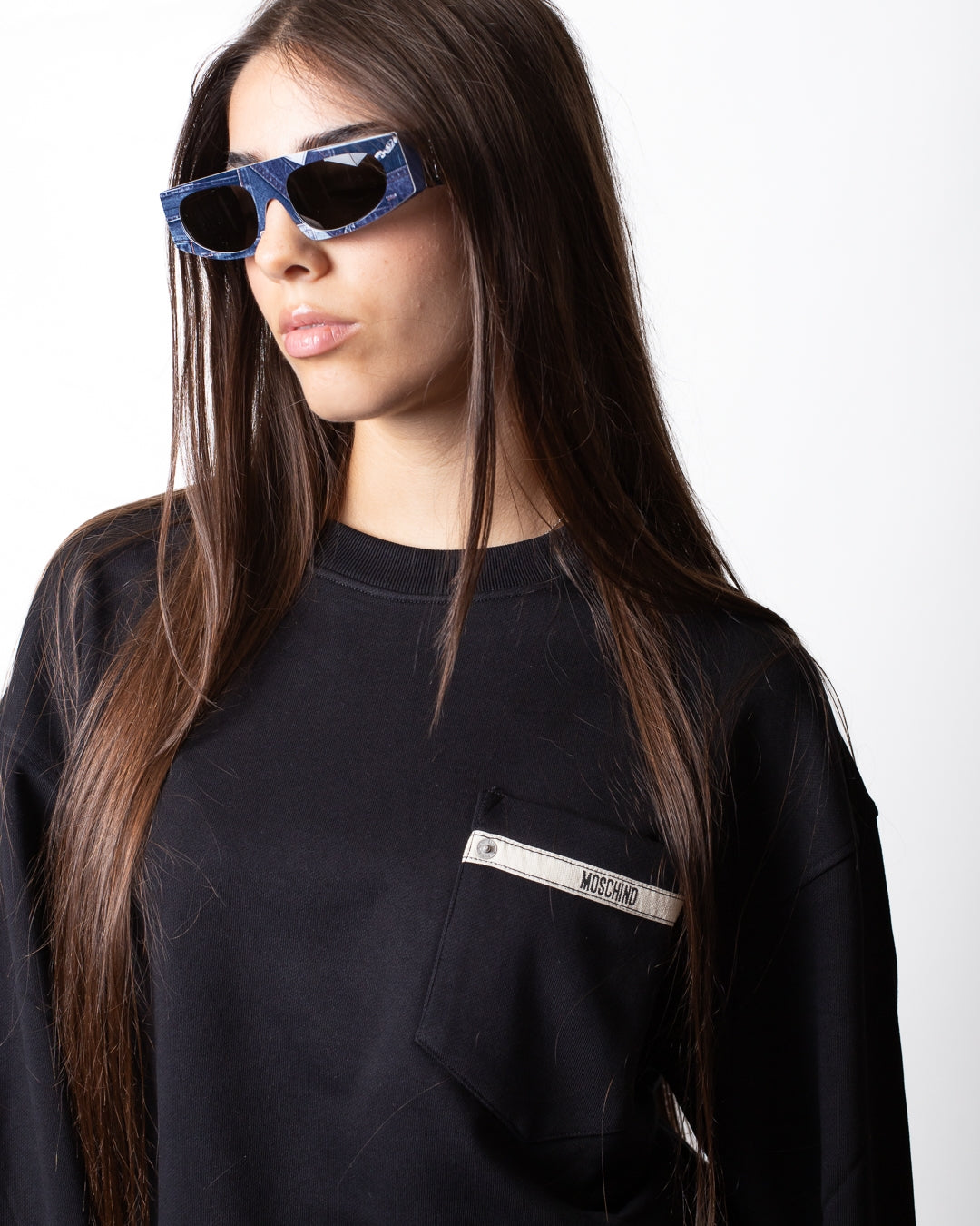 Felpa Moschino girocollo con taschino logato