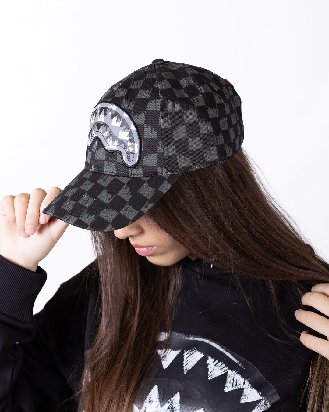 Cappello Sprayground con visiera e logo in pelle ricamato