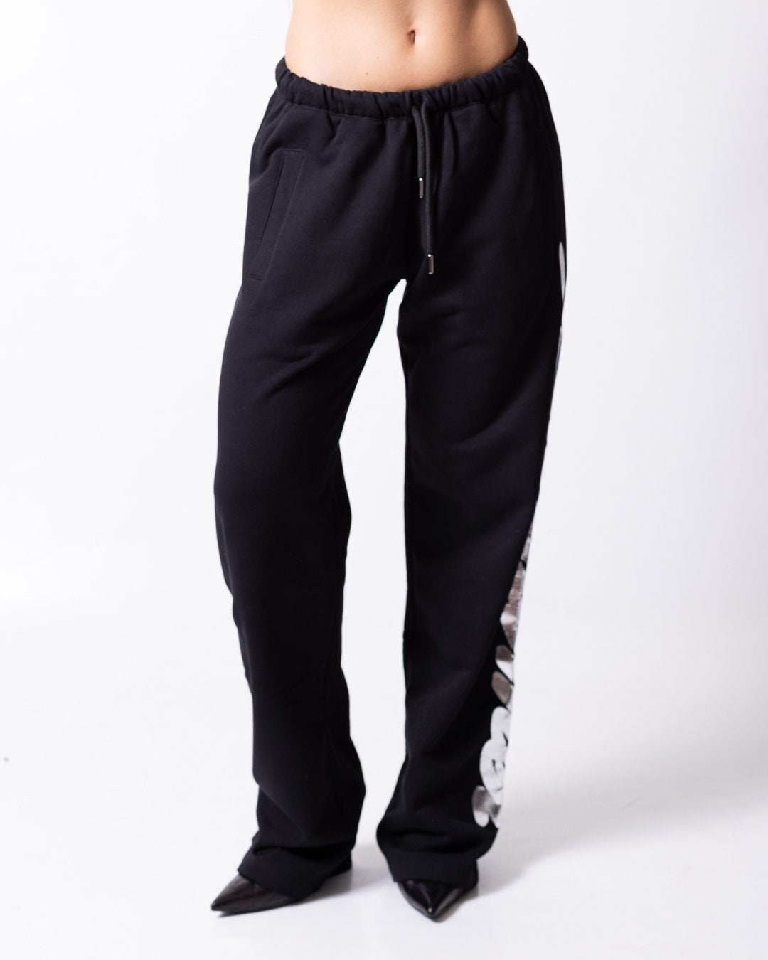 Pantalone Disclaimer con grafica "Disclaimer" stampata