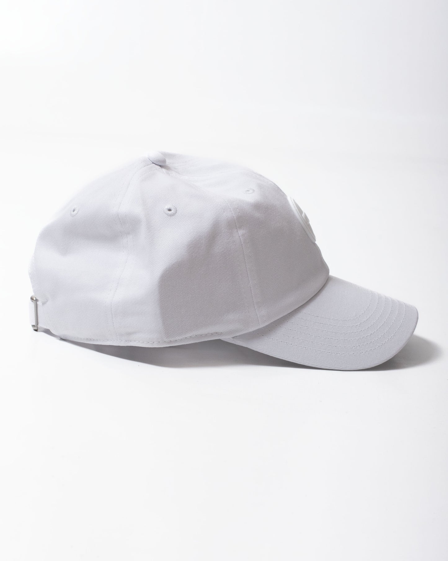 Cappello Colmar con visiera e logo in gomma
