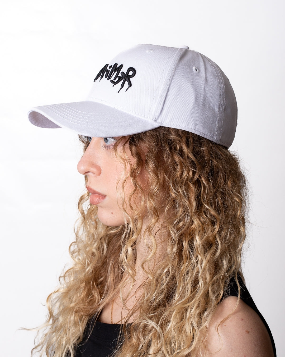 Cappello Disclaimer con visiera e logo in rilievo