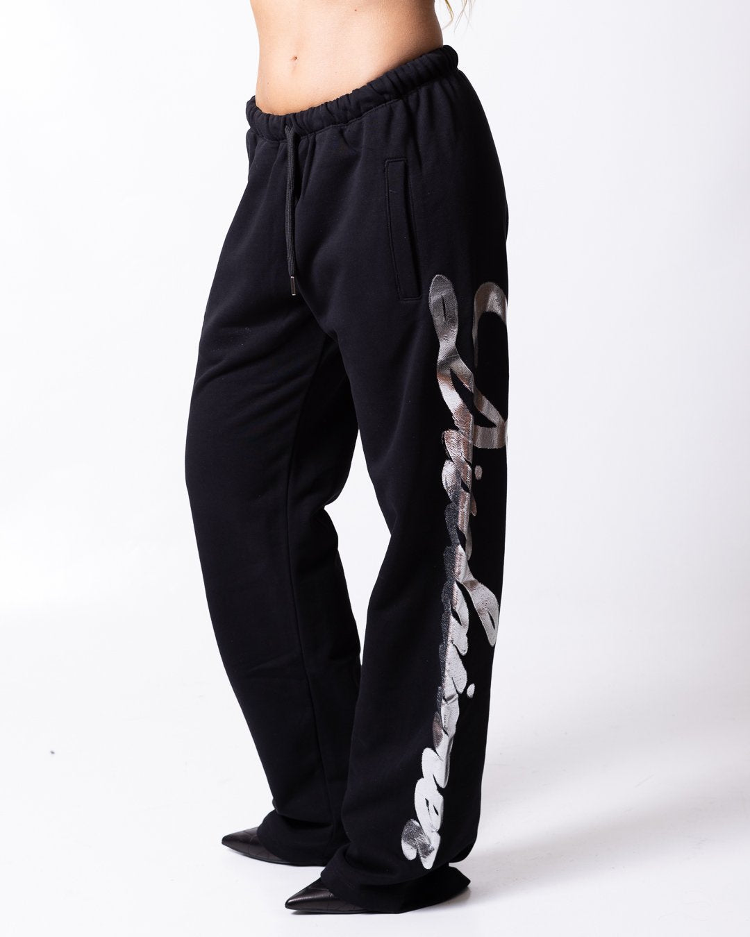 Pantalone Disclaimer con grafica "Disclaimer" stampata