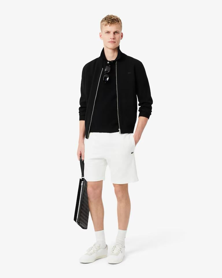 Bermuda Lacoste in felpa con fasce logate uomo