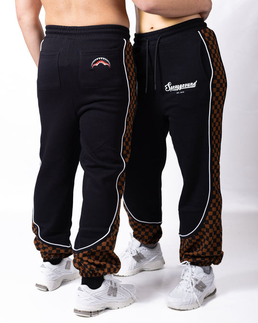 Pantalone Sprayground "brown check" con logo stampato e patch decorativa