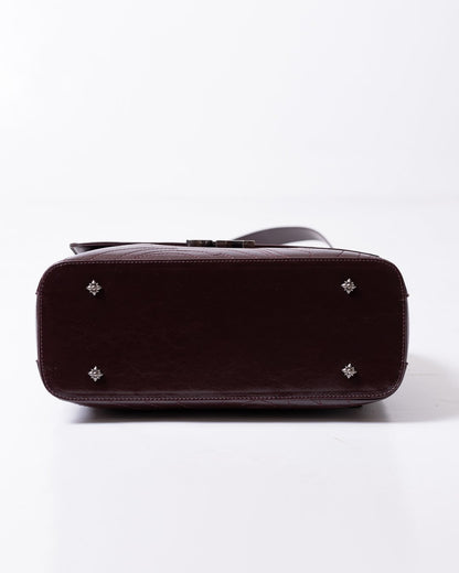 Borsa John Richmond con logo "JR" in pelle dalla finitura lucida e grafica in ricamo