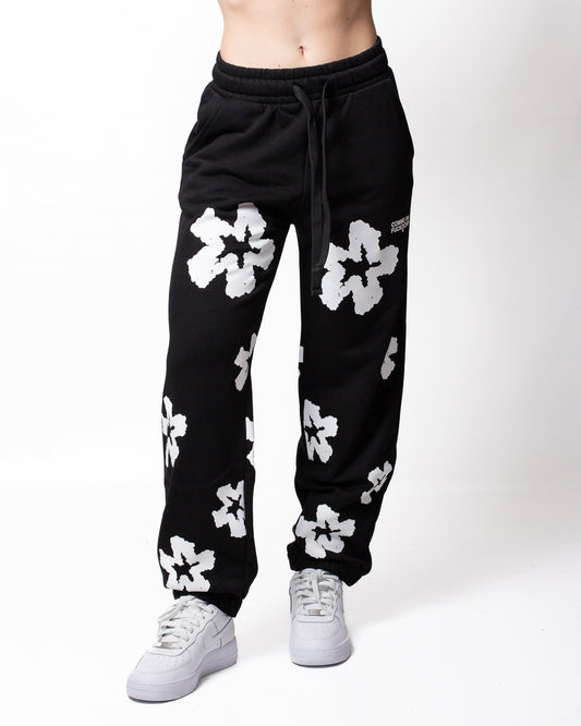 Pantalone Comme des Fuckdown in felpa con fiori all-over donna