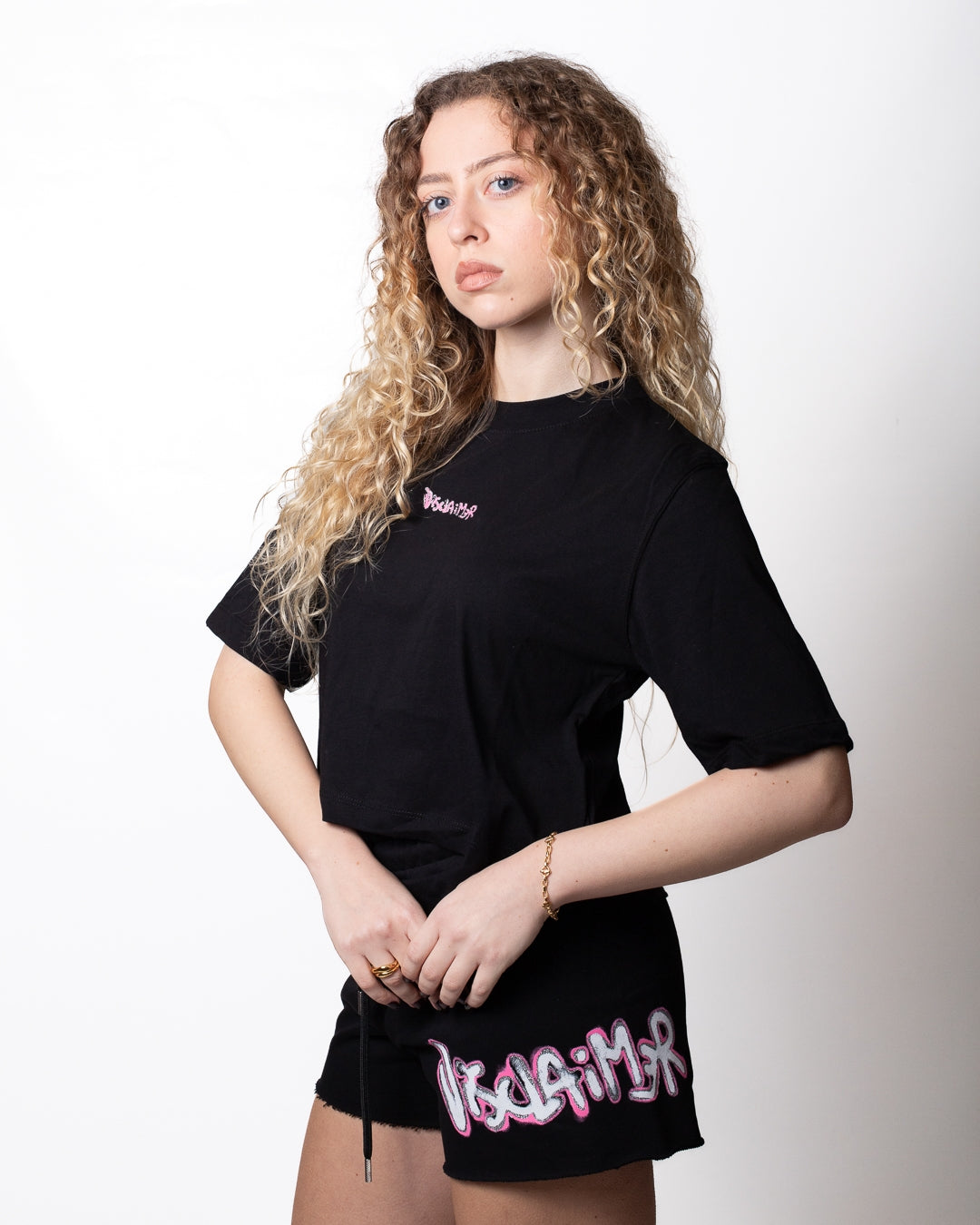 T-Shirt Disclaimer cropped con stampa e logo glitter donna