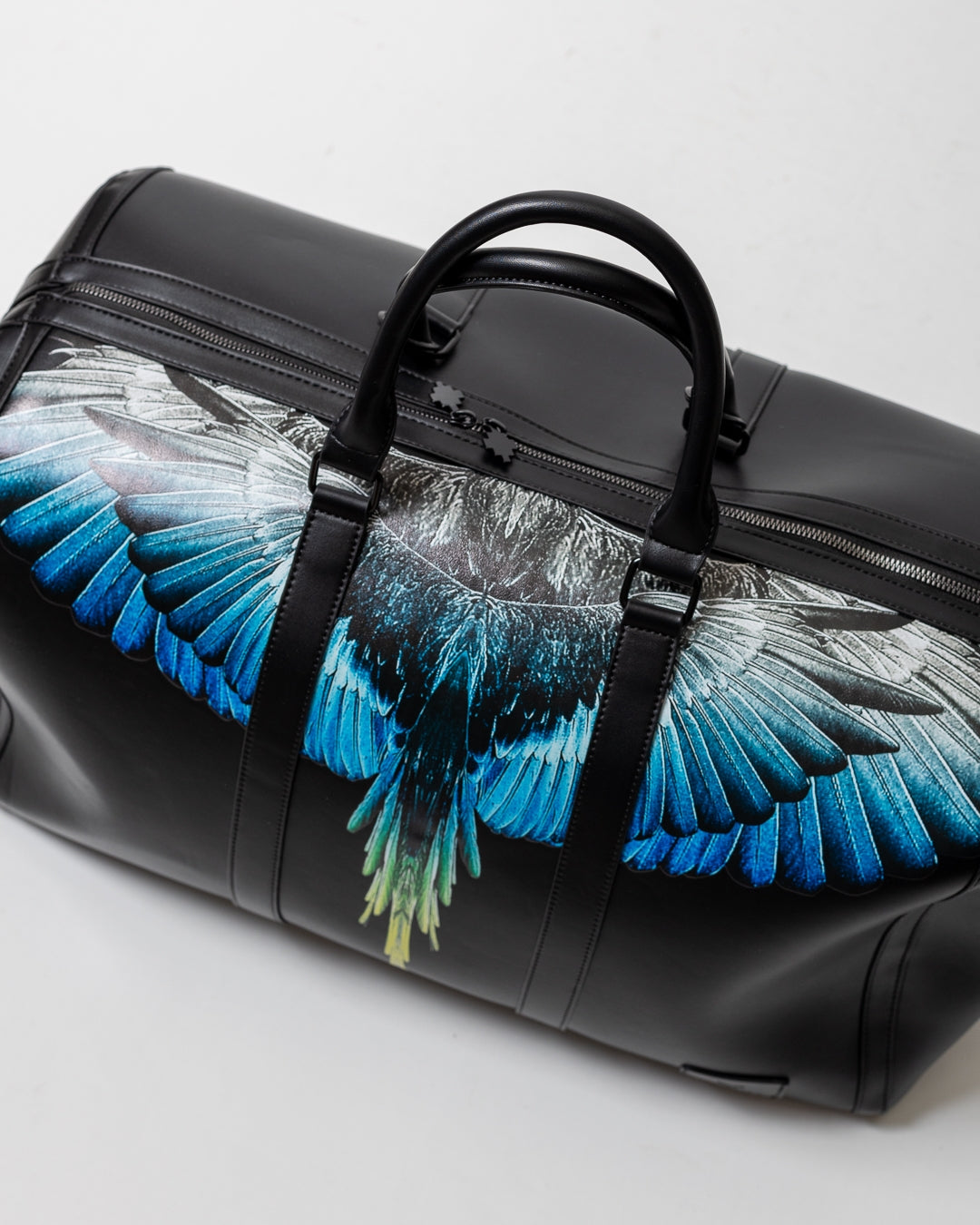 Borsone Marcelo Burlon in ecopelle "Icon Wings Royal" logato