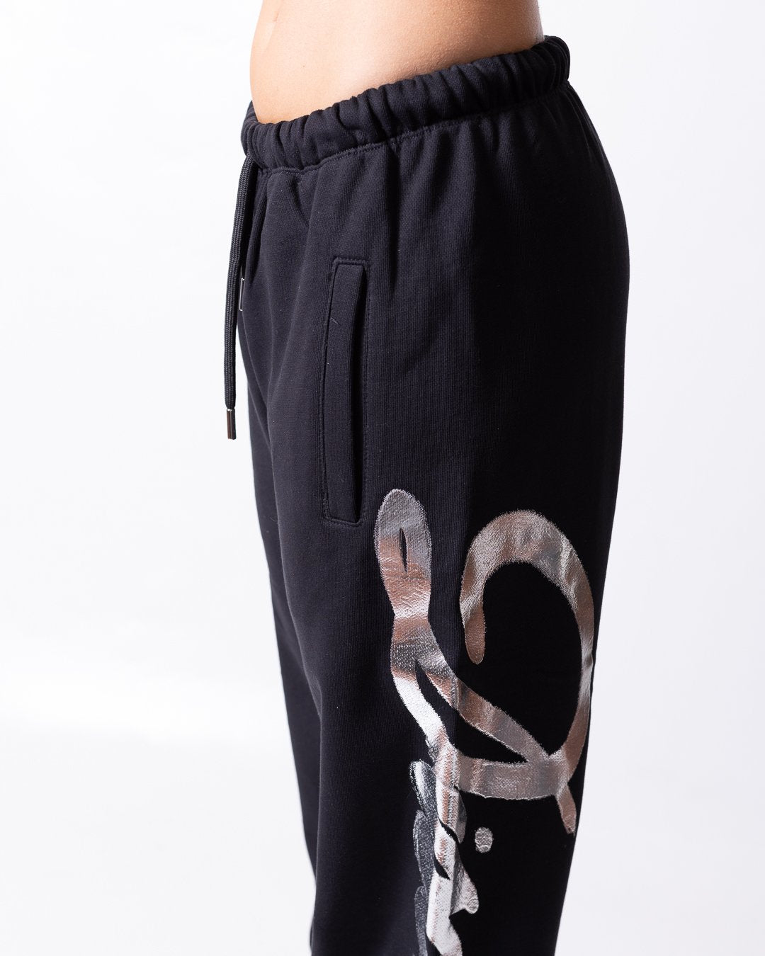 Pantalone Disclaimer con grafica "Disclaimer" stampata