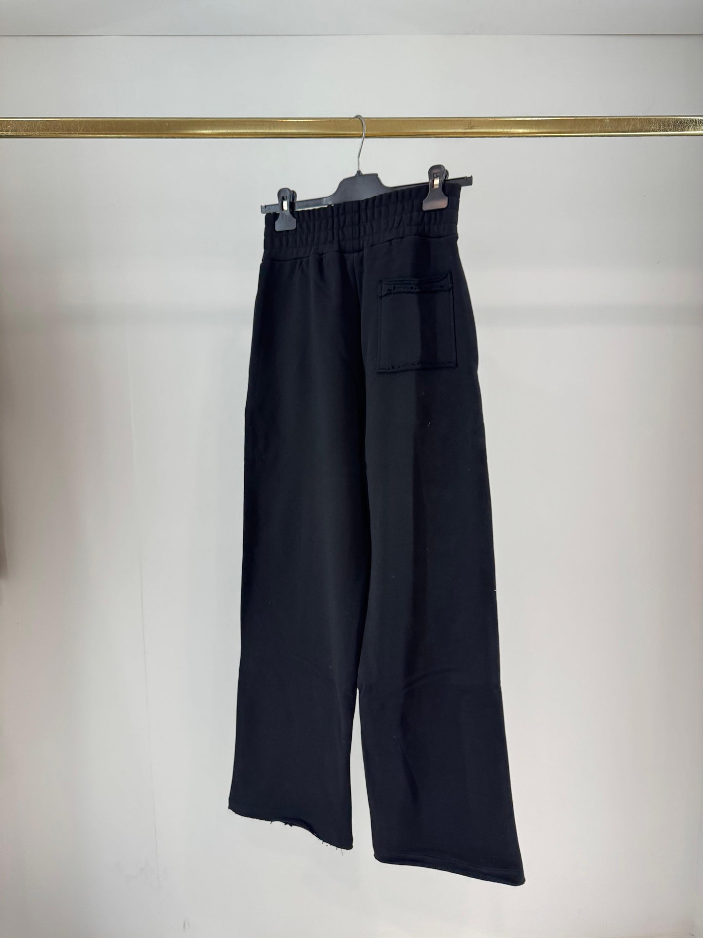 Pantalone Comme des Fuckdown in felpa con nervature ed etichetta donna