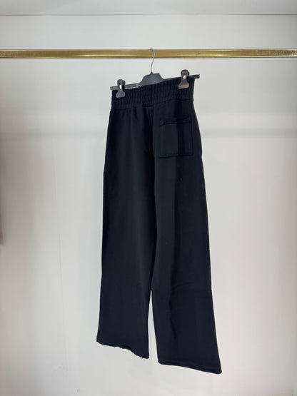 Pantalone Comme des Fuckdown in felpa con nervature ed etichetta donna