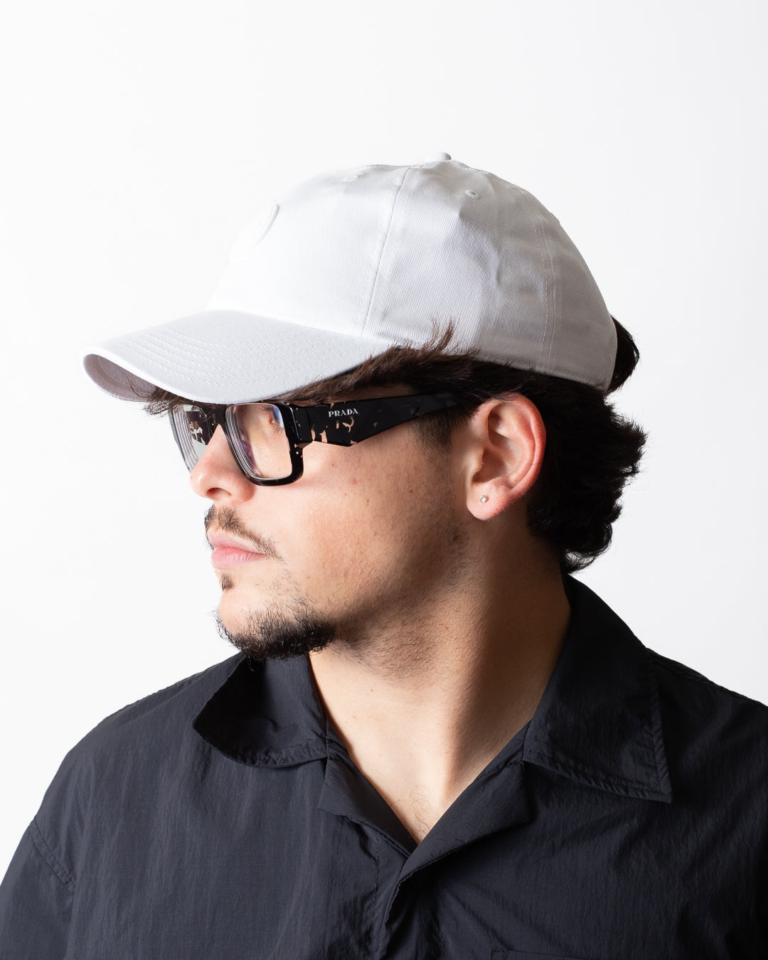 Cappello Colmar con visiera e logo in gomma