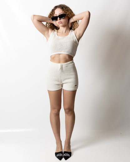 Top Disclaimer cropped in maglia traforata donna