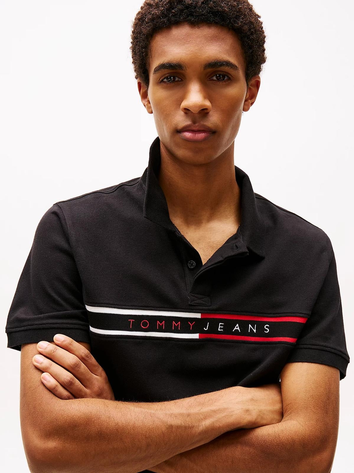 Polo Tommy Jeans con banda logata uomo