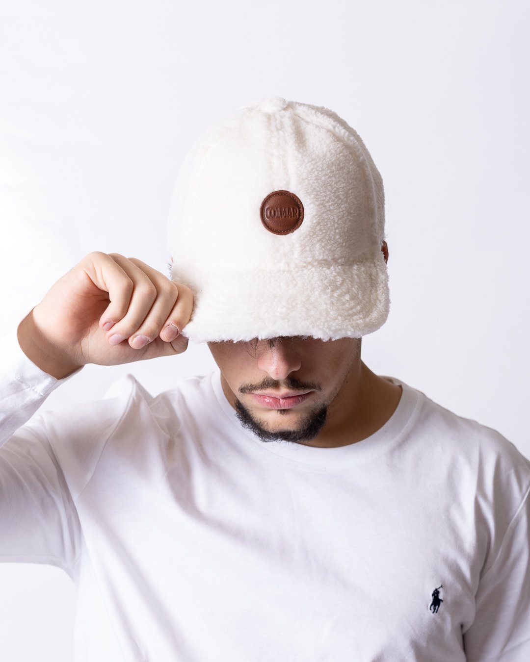 Cappello Colmar con visiera e logo in rilievo
