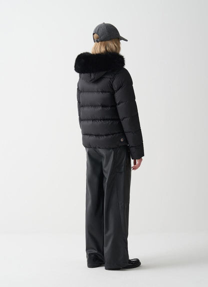 Giubbotto Colmar con cappuccio ed ecopelliccia "Deluxe" donna