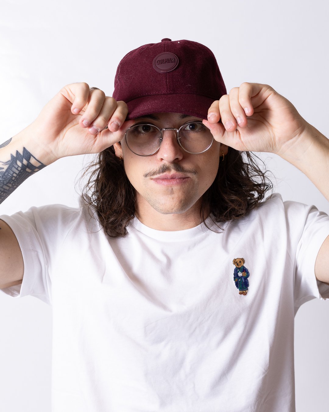 Cappello Colmar in lana con visiera e logo in rilievo