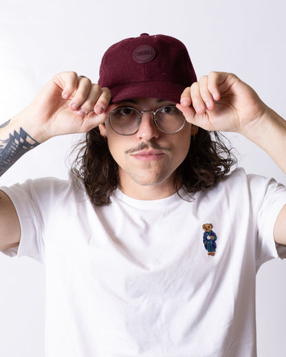 Cappello Colmar in lana con visiera e logo in rilievo