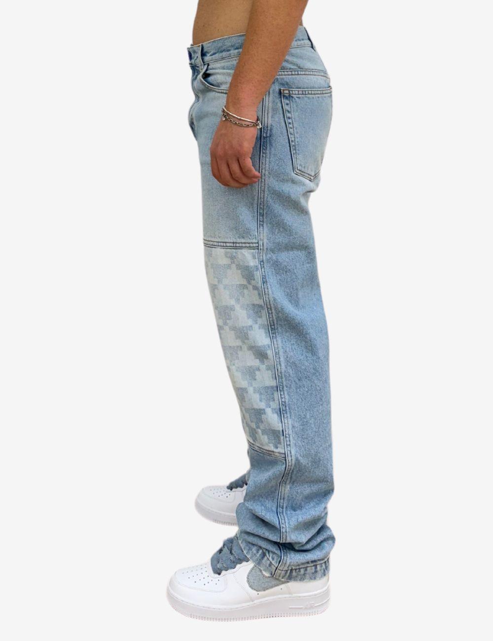 Jeans Marcelo Burlon in denim chiaro uomo Specchio Boutique