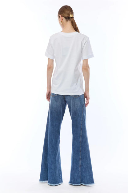 Jeans Nenette a zampa con occhielli donna