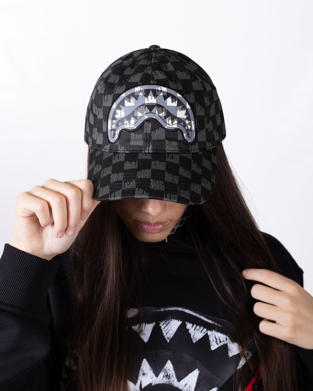 Cappello Sprayground con visiera e logo in pelle ricamato