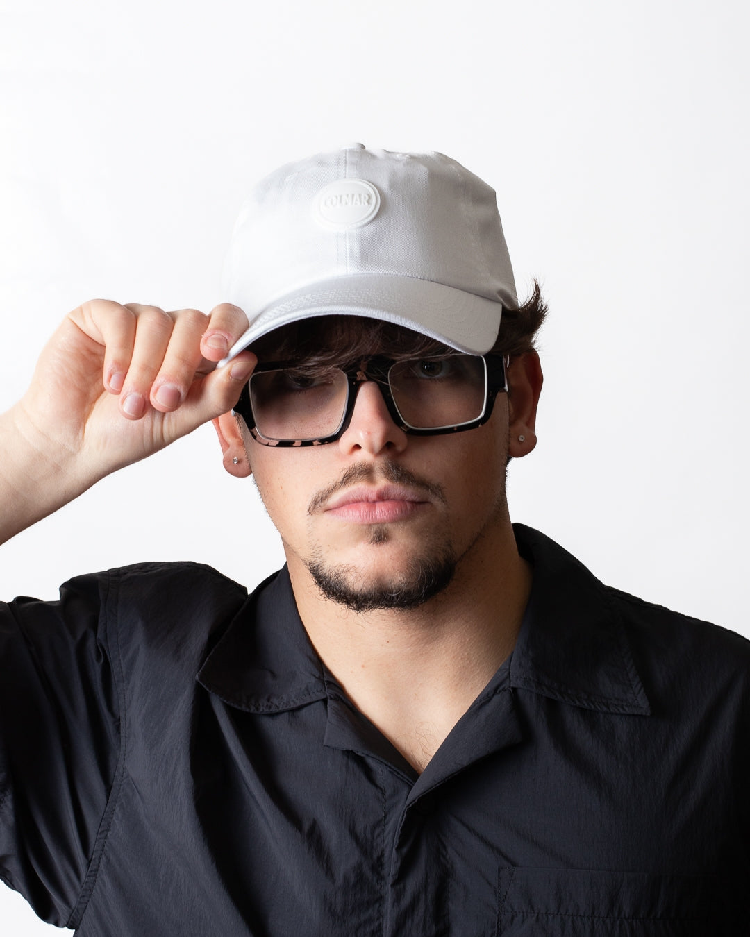 Cappello Colmar con visiera e logo in gomma