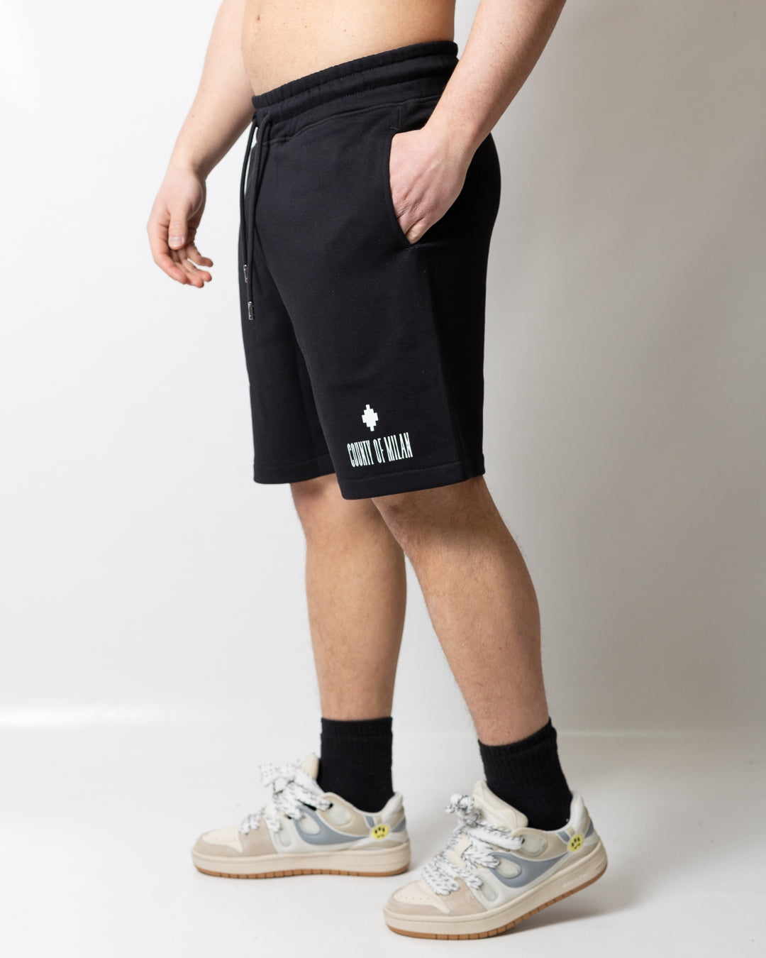 Bermuda Marcelo Burlon in felpa con logo County uomo