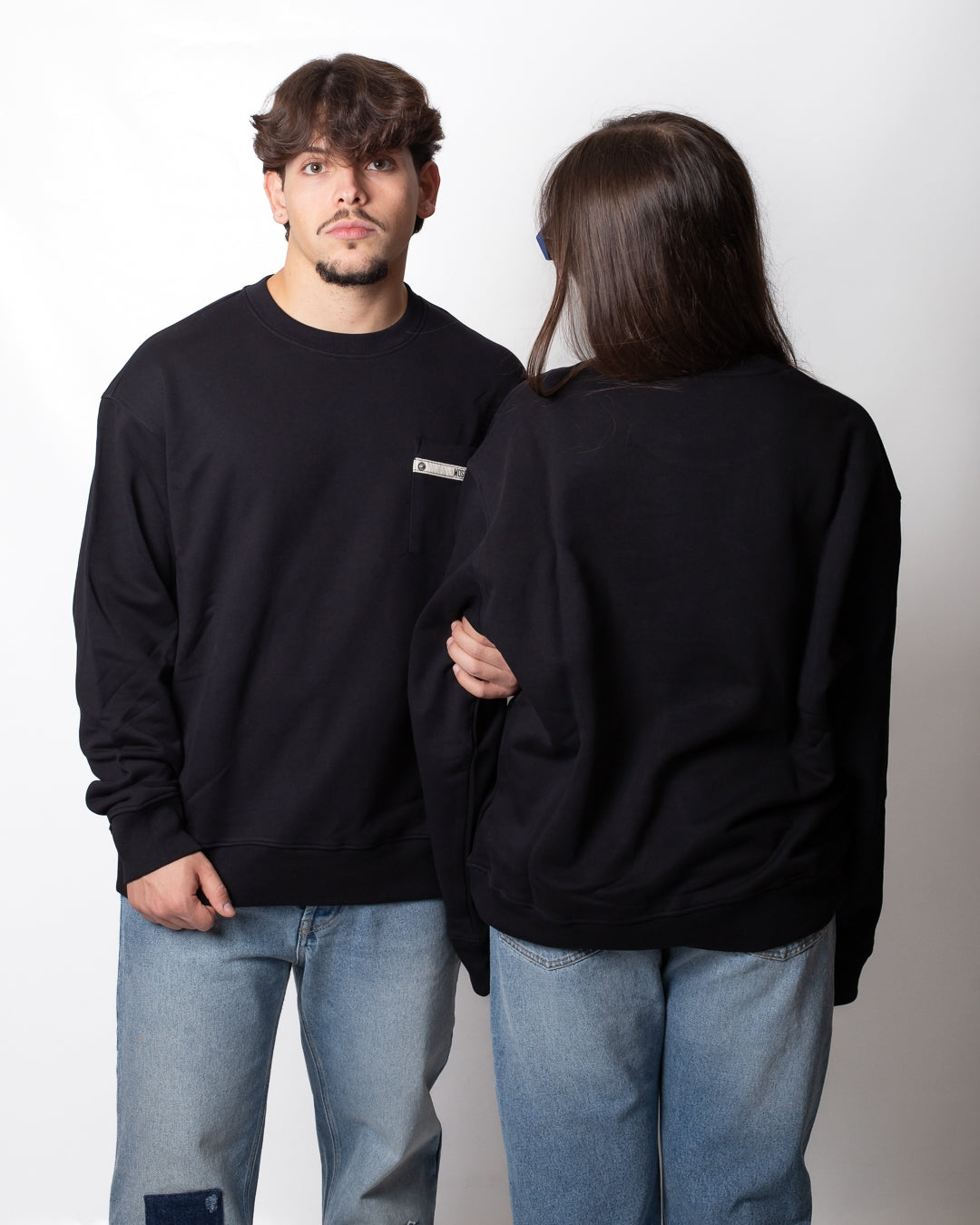 Felpa Moschino girocollo con taschino logato