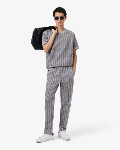 Pantalone Lacoste logato allover uomo