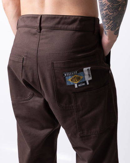 Pantalone Moschino loose con patch uomo