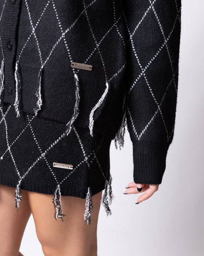 Cardigan Richmond X in maglia con rombi "argyle" e dettaglio sfilacciato sul fondo