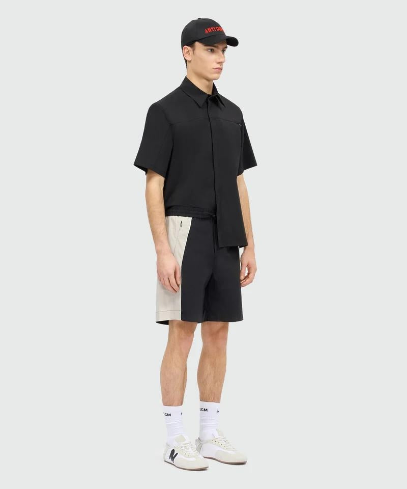 Bermuda MSGM stretch con logo e zip