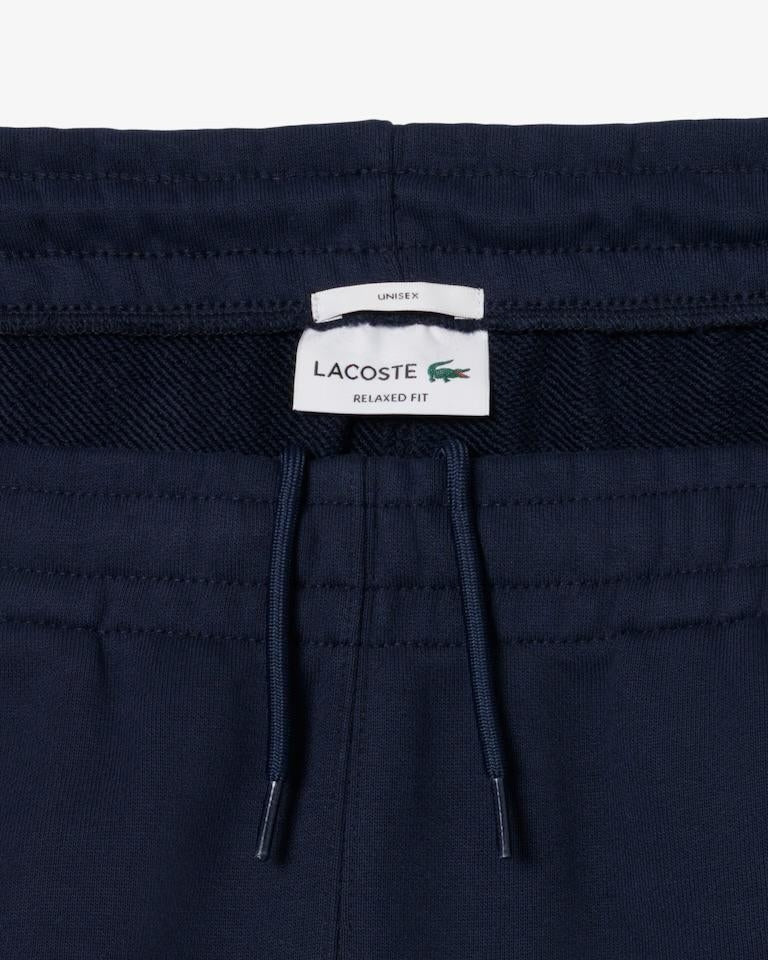 Pantalone Lacoste in felpa con logo tono su tono uomo