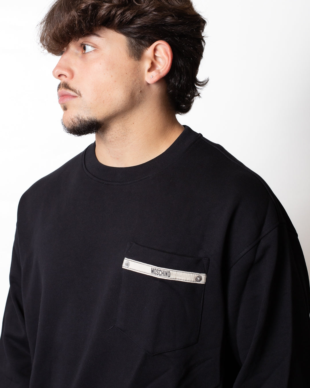 Felpa Moschino girocollo con taschino logato