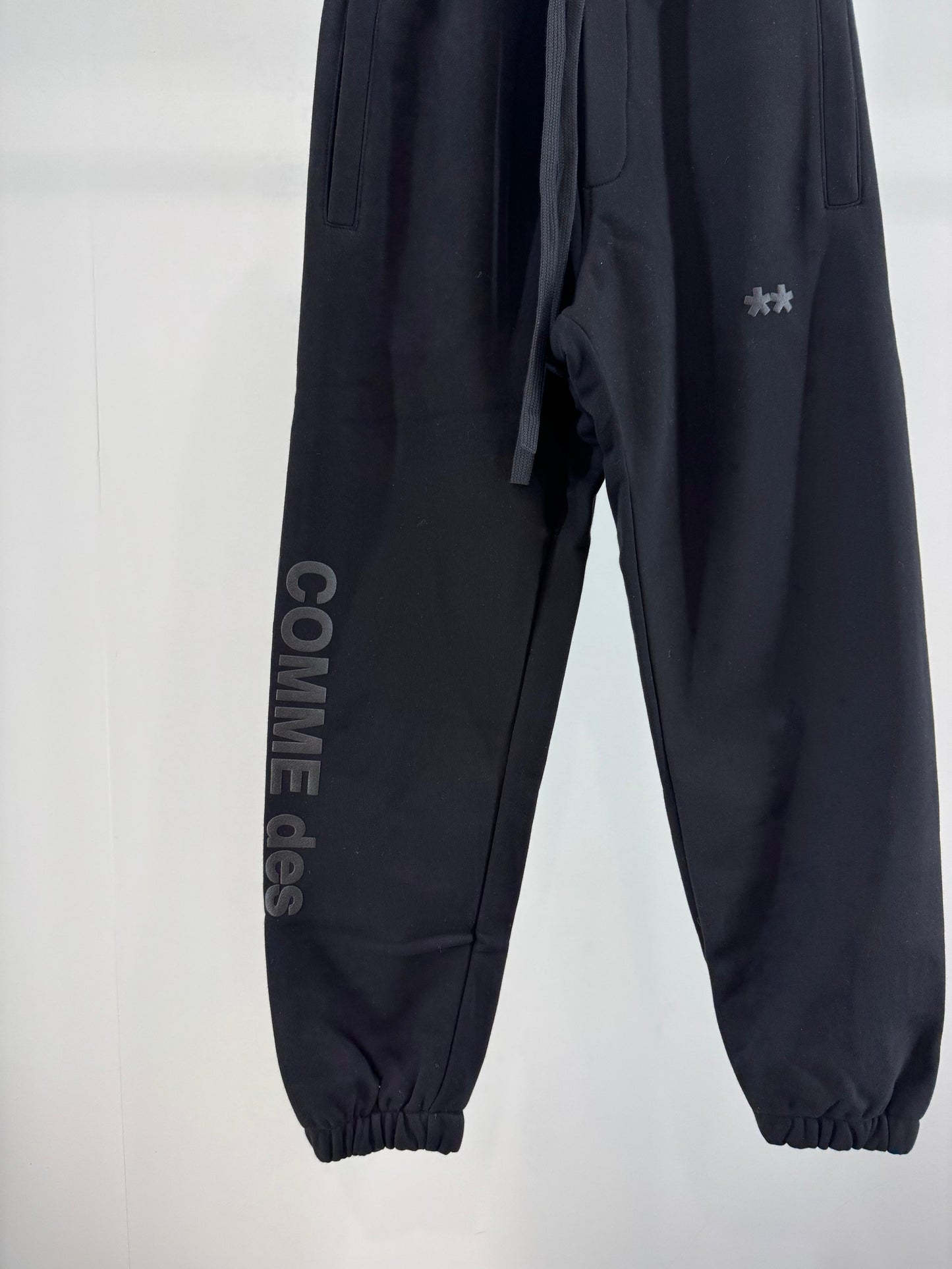 Pantalone Comme des Fuckdown in felpa con stampa puffy uomo