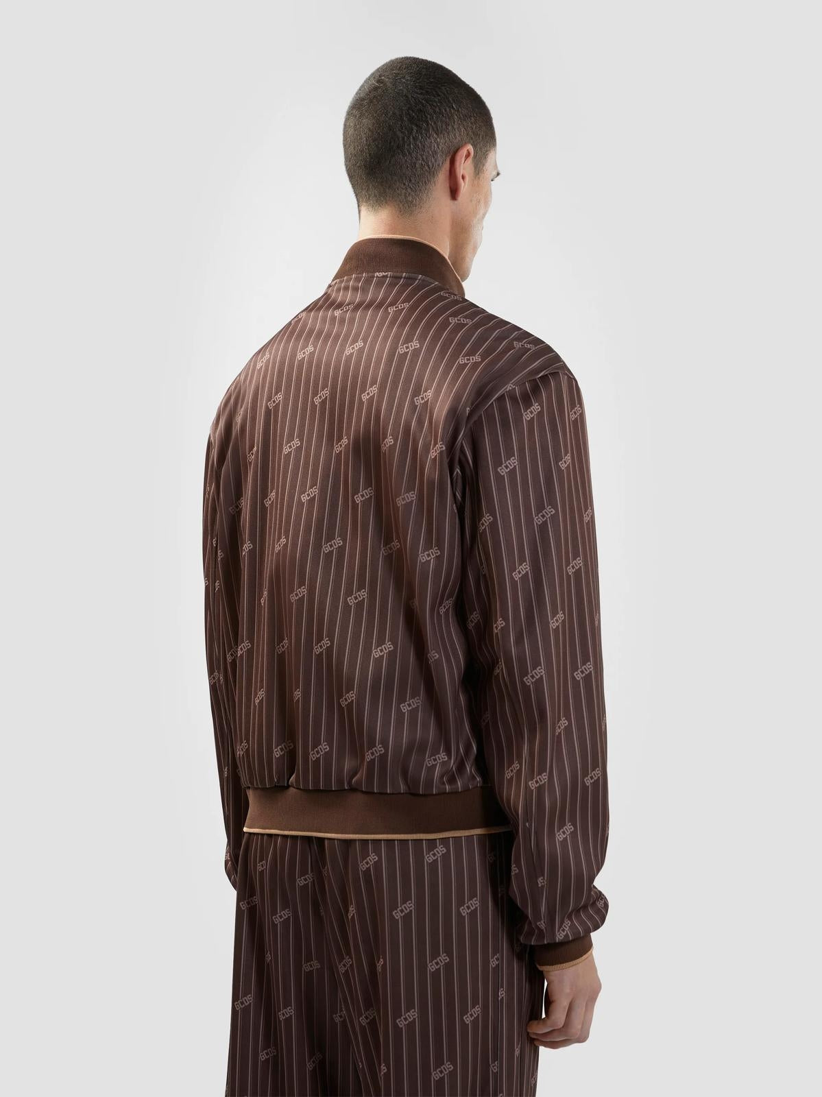 Felpa GCDS fullzip in acetato con logo all-over uomo