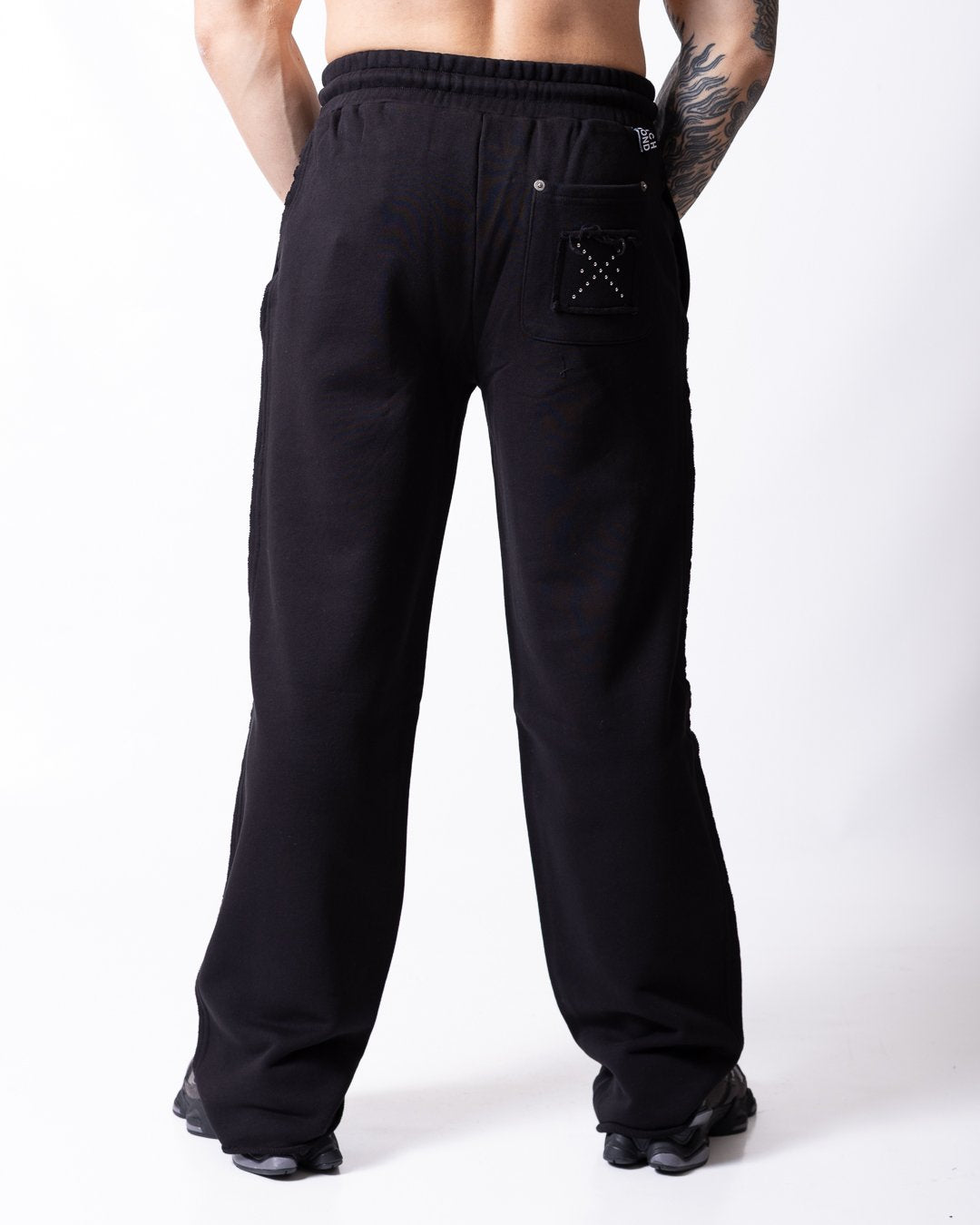 Pantalone Richmond X con applicazioni e dettagli taglio vivo