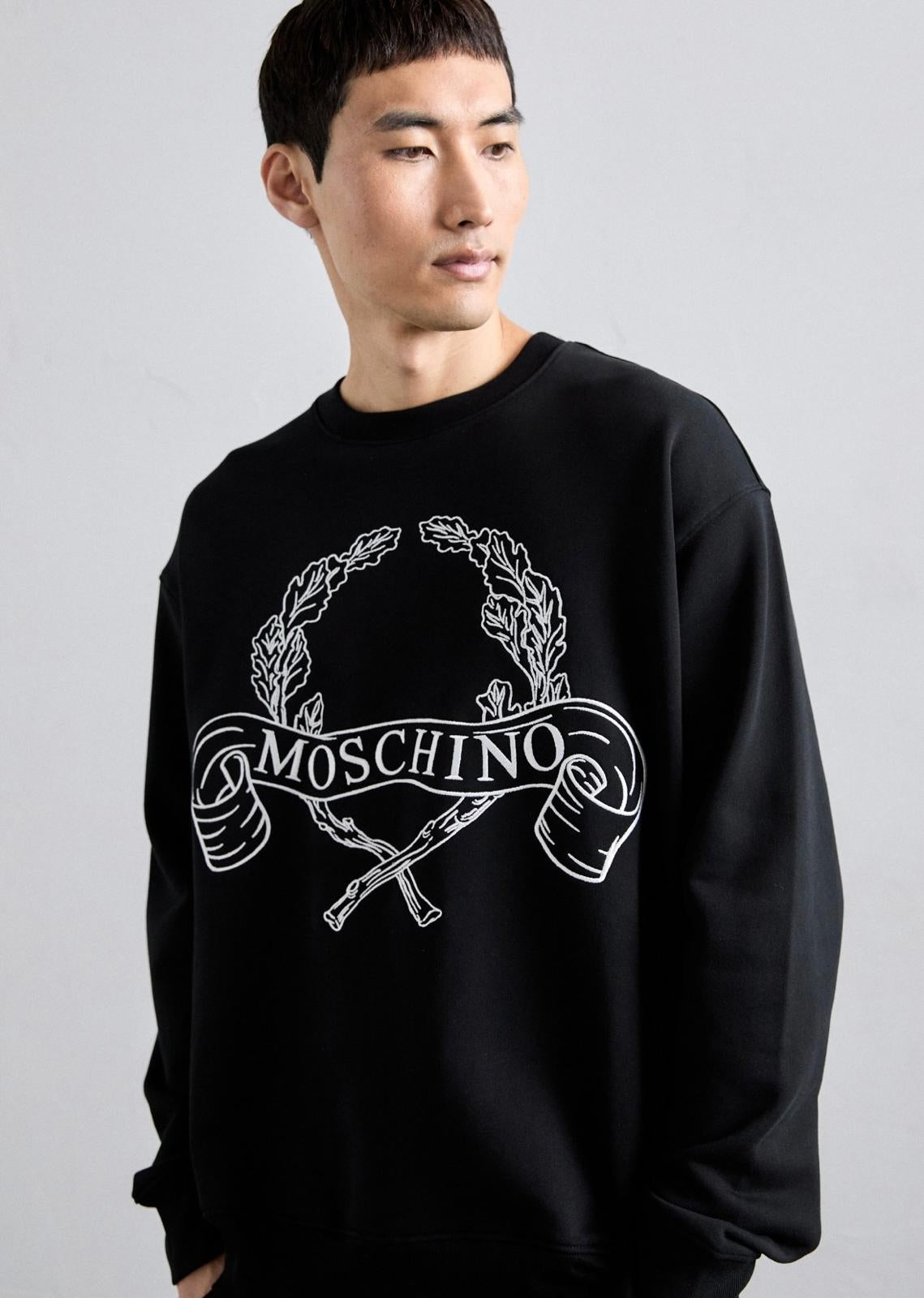 Felpa Moschino girocollo con ricamo logato "Laurel crown"