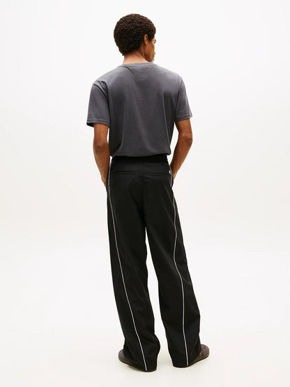 Pantalone Tommy Jeans in nylon "Parachute Track" uomo