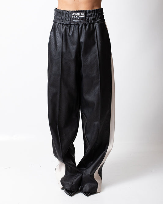 Pantalone Comme des Fuckdown in pelle con patch donna