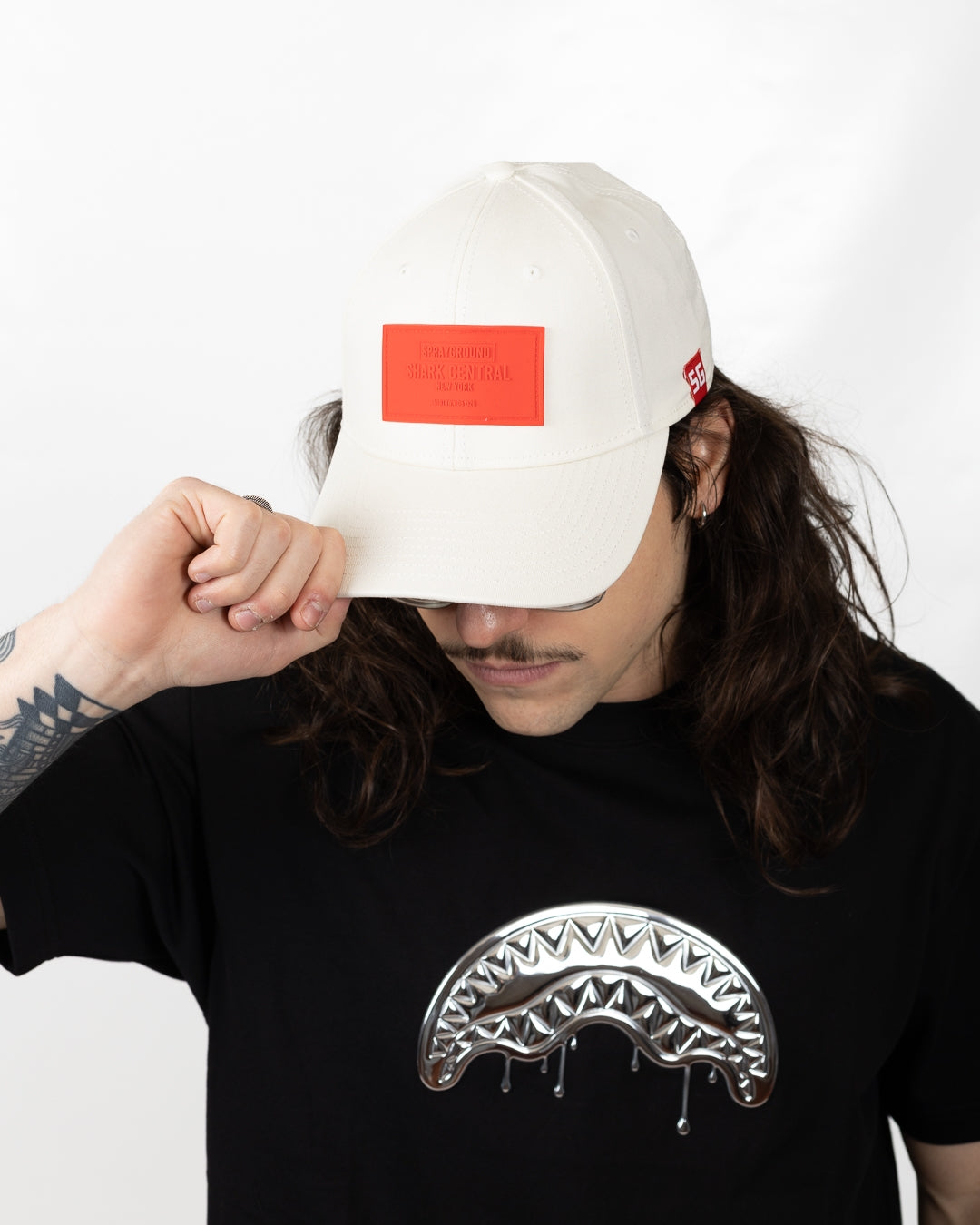 Cappello Sprayground con patch logata