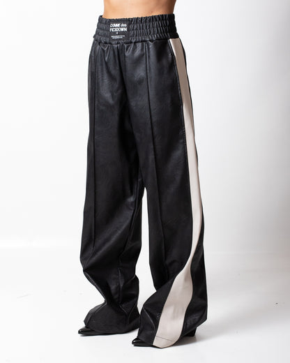 Pantalone Comme des Fuckdown in pelle con patch donna
