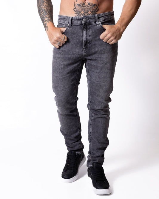 Jeans Tommy Jeans slim tapered con patch logo