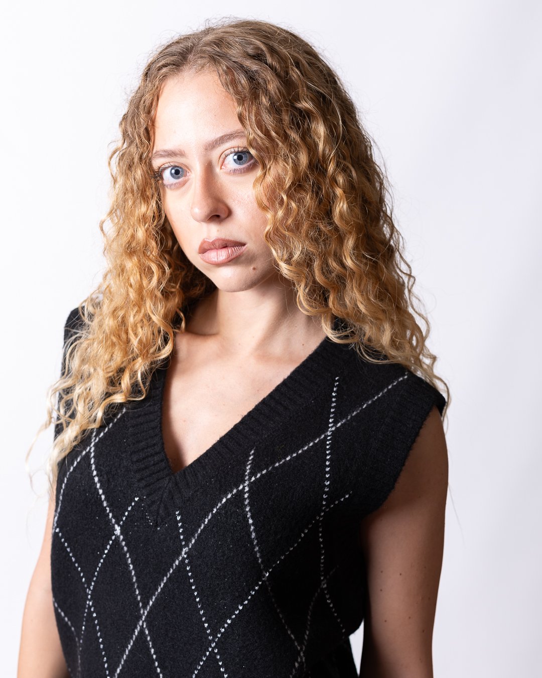 Gilet Richmond X in maglia con rombi "argyle" e dettaglio sfilacciato sul fondo